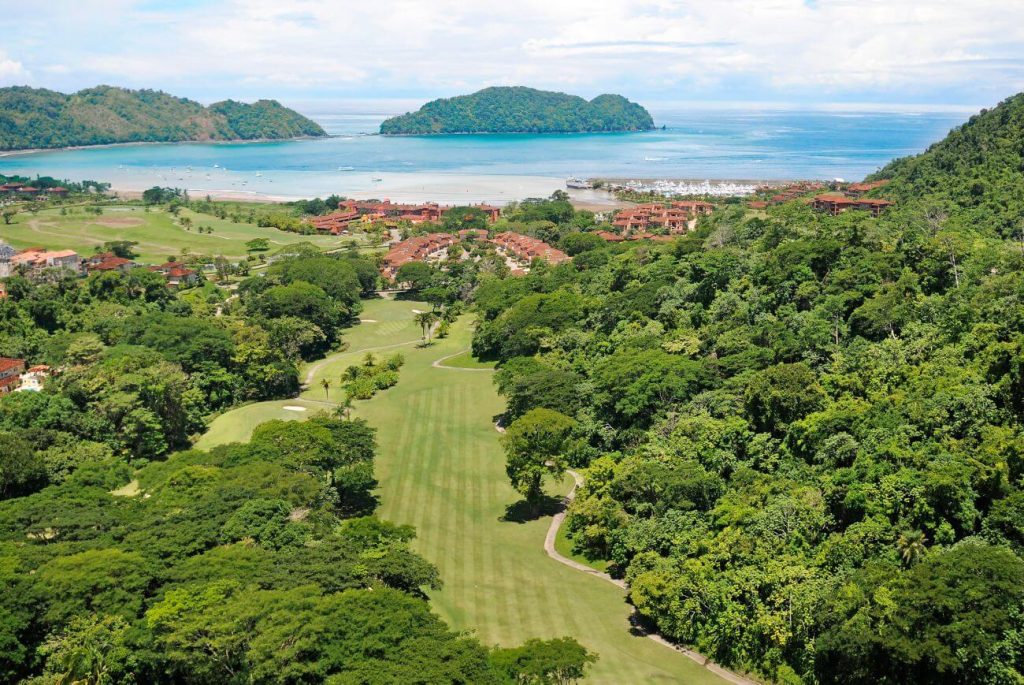 Aerial view of Los Sueños Marriott Resort in Jaco, Costa Rica with golf course, marina, and ocean in the background